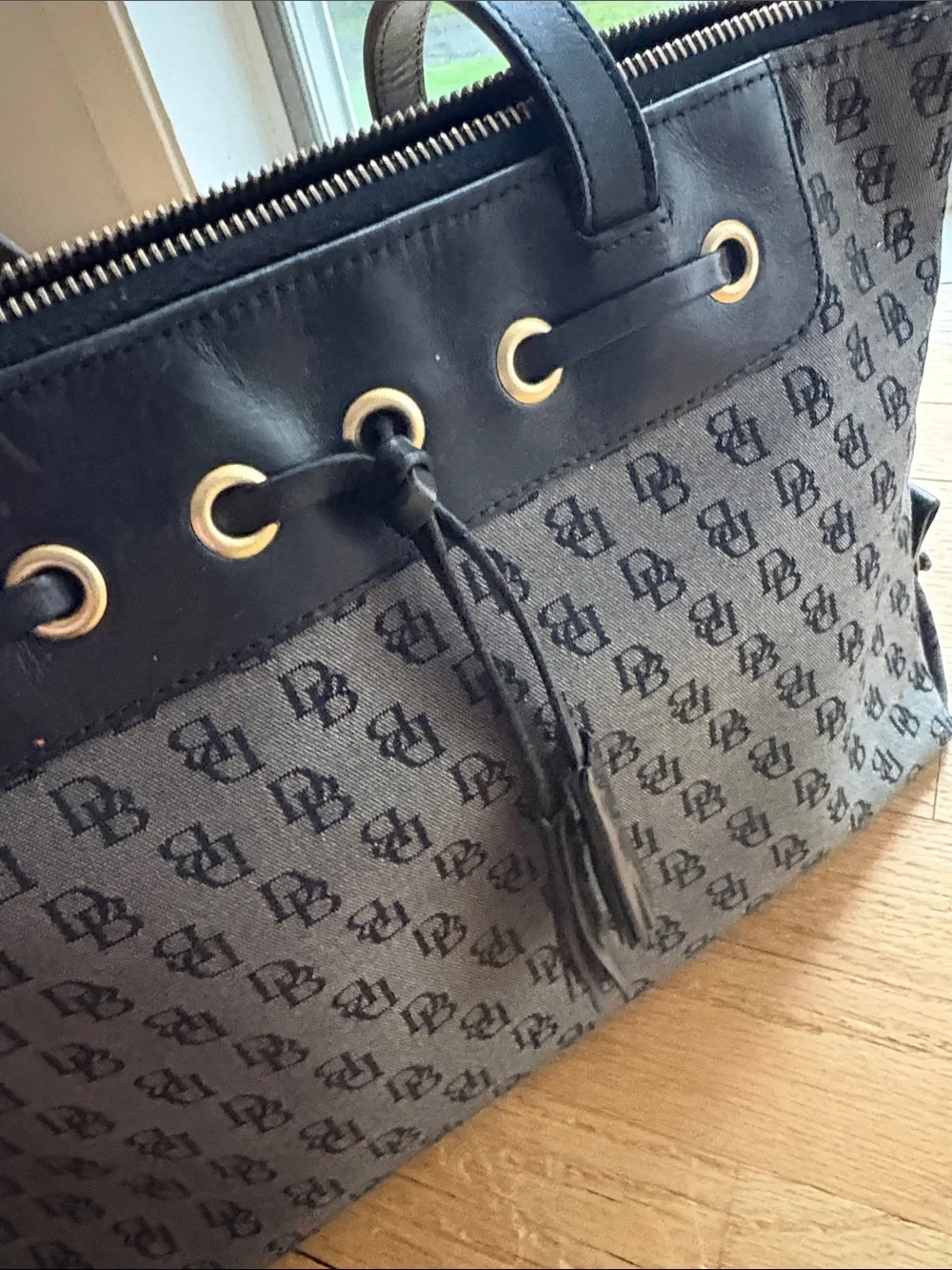 Dooney Black Patterned Tote Bag with Grommet Detail - woman’s